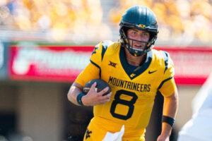 WVU QB Nicco Marchiol seeing a specialist for foot injury, questionable to play against Utah